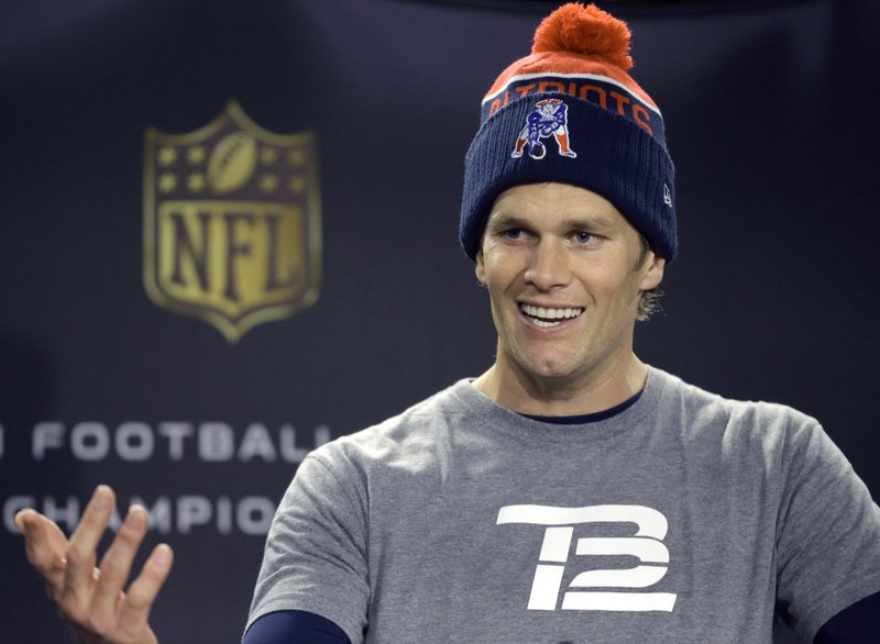 New England Patriots quarterback Tom Brady faces reporters before an NFL football practice, Thursday, Jan. 21, 2016, in Foxborough, Mass. The Patriots are to play the Denver Broncos in the AFC Championship on Sunday in Denver. (AP Photo/Steven Senne)