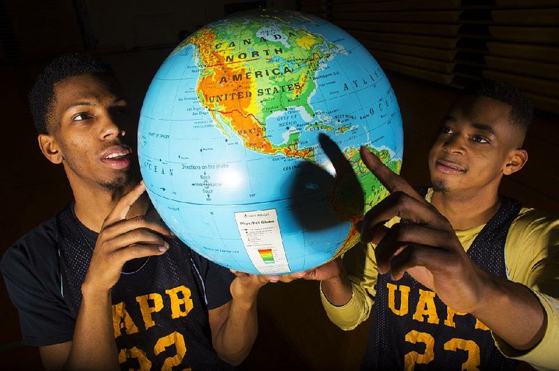 UAPB guards JoVaughn Love (left) and Ghiavonni Robinson have spent a great deal of time traveling this season. The Golden Lions played their first 17 games away from home, logging more than 27,400 miles and playing in 12 states over a 62-day stretch. UAPB was the last team in NCAA Division I to play a home game when it faced Southern on Jan. 16.