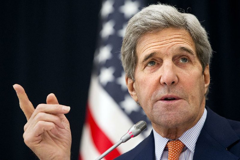 Secretary of State John Kerry talks to reporters Saturday in Riyadh, Saudi Arabia, after attending meetings about Syria and Iran.