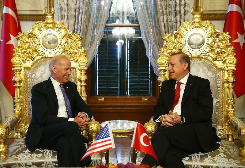 U.S. Vice President Joe Biden (left) talks with Turkish President Recep Tayyip Erdogan on Saturday before their meeting at Yildiz Mabeyn Palace in Istanbul.