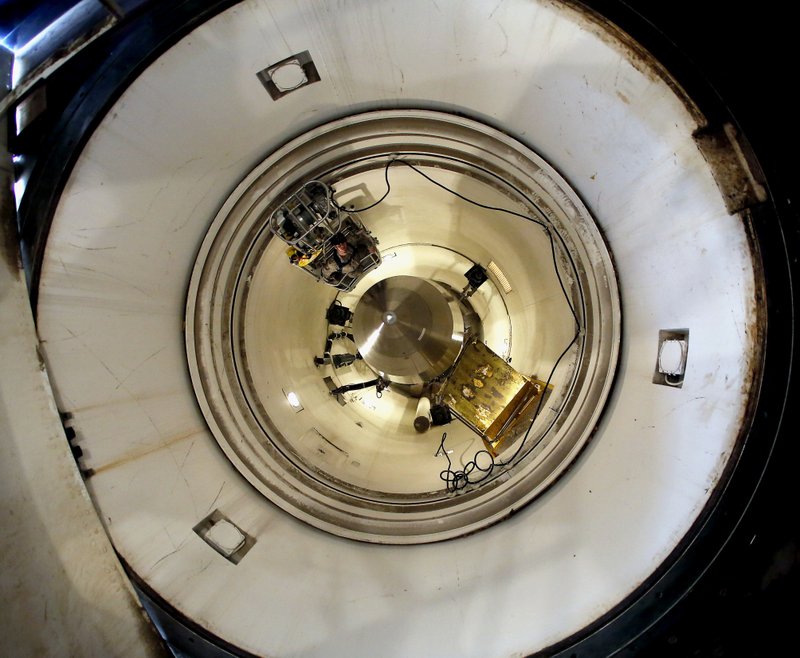 An inert Minuteman 3 missile is seen in a training launch tube at Minot Air Force Base, N.D. In the spring of 2014, as a team of experts was examining what ailed the U.S. nuclear force, the Air Force withheld from them the fact that it was simultaneously investigating damage to a nuclear-armed missile in its launch silo caused by three airmen. 