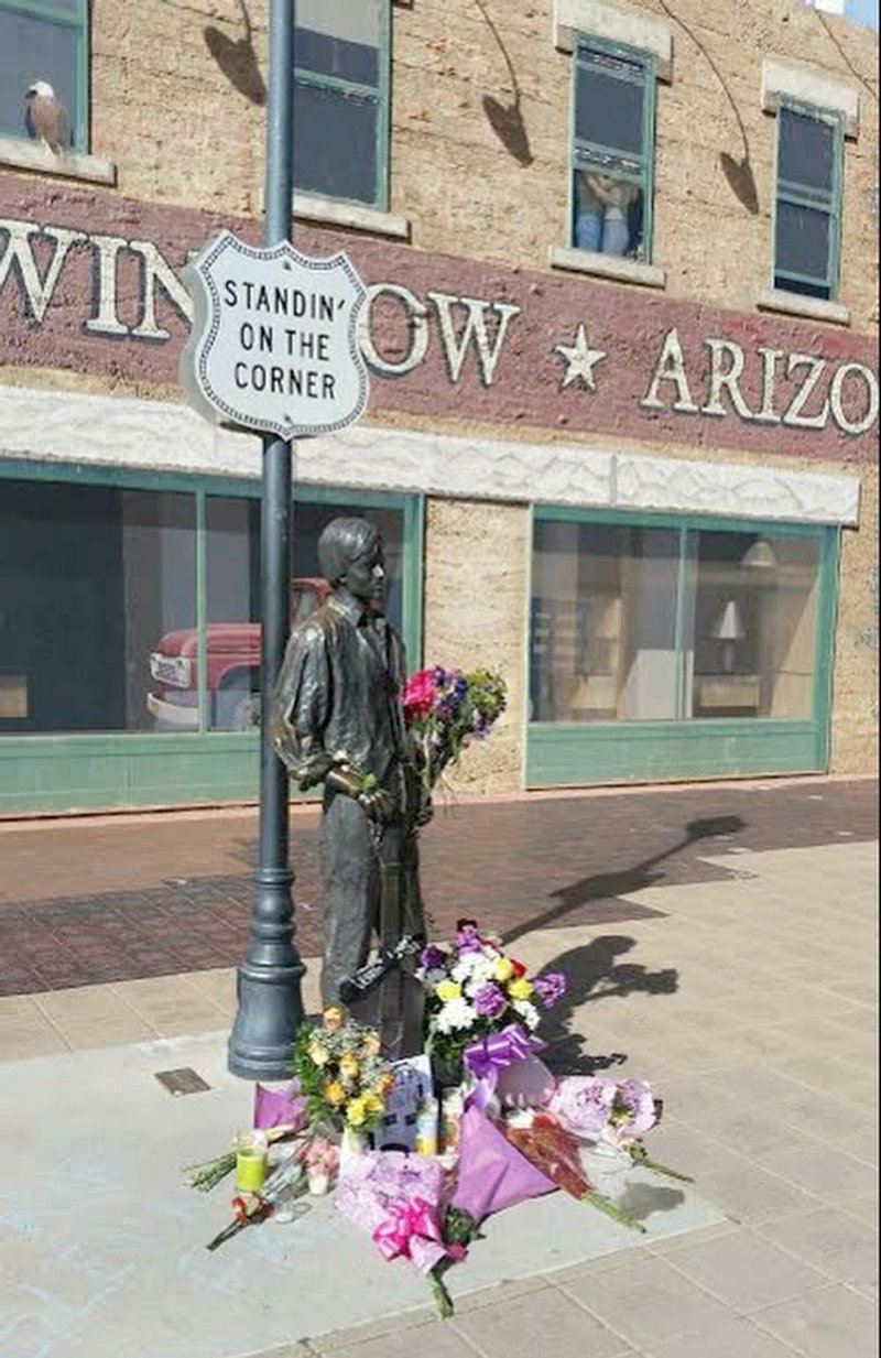 Fans are leaving flowers at the corner in Winslow, Ariz., made famous by the 1972 Eagles’ song “Take It Easy,” to honor the late Glenn Frey.