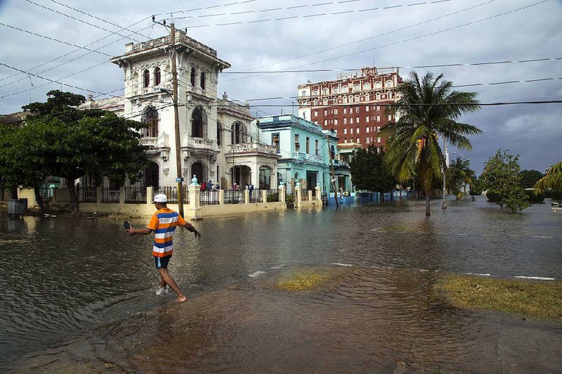 A portion of Avenida de los Presidentes in Havana was flooded Saturday after a storm brought much-needed rainfall. President Barack Obama made another attempt Tuesday to enhance U.S.-Cuba commerce with a series of new trade and travel regulations. 