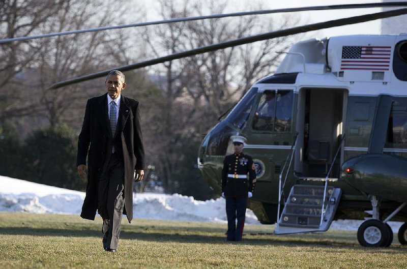 President Barack Obama arrives Monday on the South Lawn of the White House in Washington. 