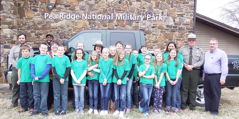 TIMES photograph by Annette Beard Student ambassadors from Pea Ridge Intermediate School with teacher Brandy Knight, Kevin Eads, Sheri Nodine, Nolan Moore from the Pea Ridge National Military Park, and Mitchell Simpson and Patti Springs from the Arkansas Economic Development Commission Energy Office celebrated the students&#8217; commitment to green living and the new F250 4x4 crew cab LPG truck.