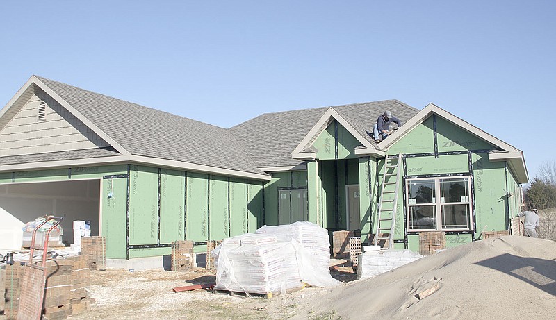LYNN KUTTER ENTERPRISE-LEADER This house is under construction on Infantry Lane in Sundowner Estates subdivision in Prairie Grove. New housing starts are up in Prairie Grove for the third year. The city issued permits for 88 new single-family homes in 2015, compared to 63 in 2014.