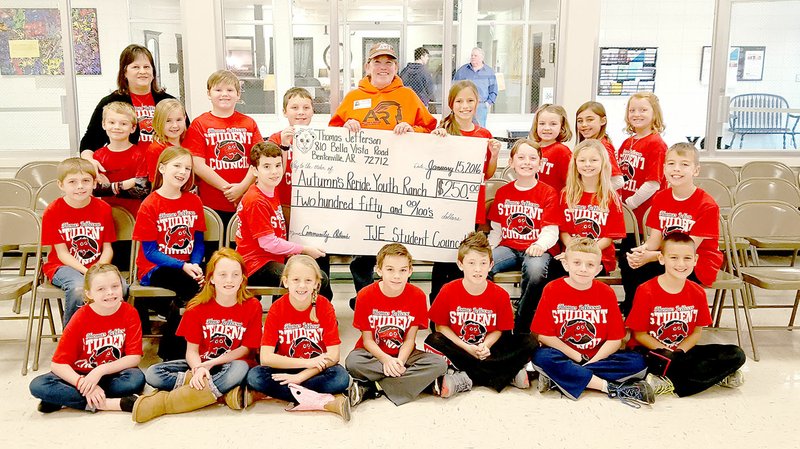Photo submitted Thomas Jefferson Elementary Student Council presented Rebecca Christians, director of Autumn&#x2019;s ReRide Youth Ranch, with a donation of $250.