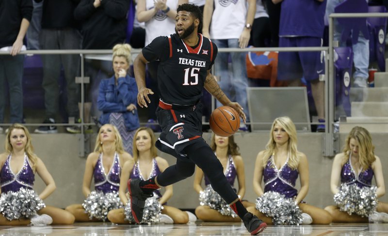 Texas Tech forward Aaron Ross (15) brings the ball up the court against TCU during the second half of an NCAA college basketball game, Monday, Jan. 18, 2016, in Fort Worth, Texas. Texas Tech won 76-69. (AP Photo/Ron Jenkins)
