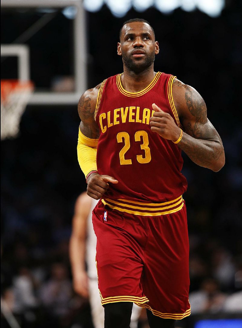 Cleveland Cavaliers forward LeBron James (23) runs down court in the second half of an NBA basketball game against the Brooklyn Nets, Wednesday, Jan. 20, 2016, in New York.
