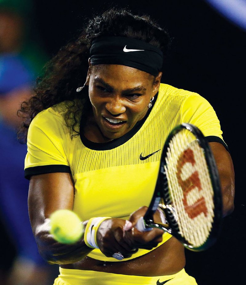 American Serena Williams hits a backhand against Agnieszka Radwanska of Poland during their semifinal match Thursday at the Australian Open in Melbourne. Williams won 6-0, 6-4 to advance to her seventh Australian Open final. 
