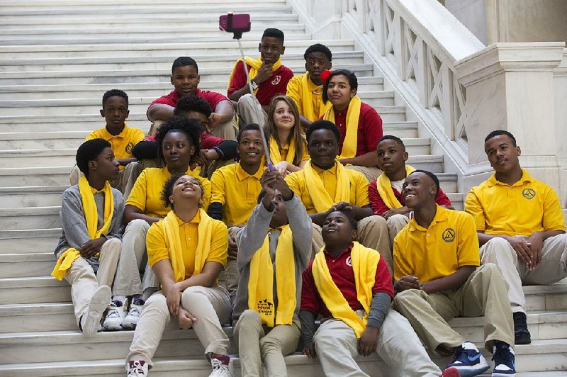 Kipp Delta College Preparatory School students pose for a “selfie” on steps inside the state Capitol on Thursday. Students, legislators and educators joined to celebrate National School Choice Week, to promote education options ranging from traditional schools and charter schools to online learning and home schooling. 