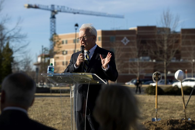 Bill Bradley, chief executive officer for Washington Regional Medical Center, speaks Thursday during a groundbreaking for a medical plaza to be built near the Fayetteville hospital.