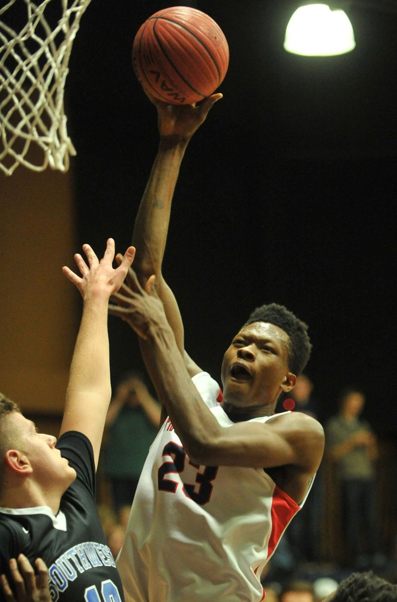 Providence Academy’s SK Shittu drives Thursday past a Southwest Christian defender at Immanuel Baptist Church in Rogers. 