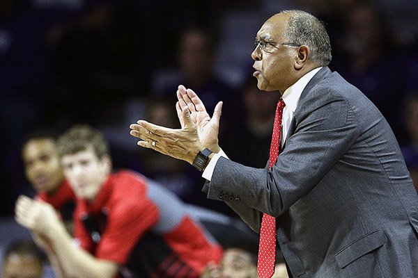 Texas Tech head coach Tubby Smith encourages his players during the first half of an NCAA college basketball game against Kansas State, Tuesday, Jan. 12, 2016, in Manhattan, Kan. (AP Photo/Charlie Riedel)
