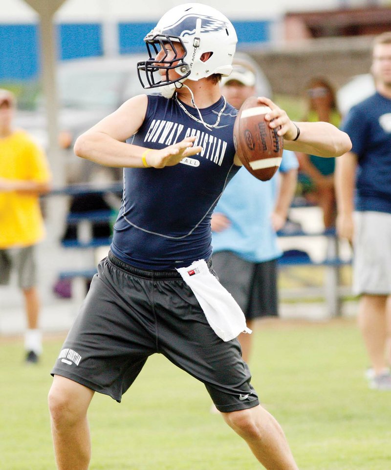 Conway Christian quarterback Jakob Henry drops back to pass during 7-on-7 action last summer.  Henry is the 2015 River Valley & Ozark Edition Offensive Player of the Year.  