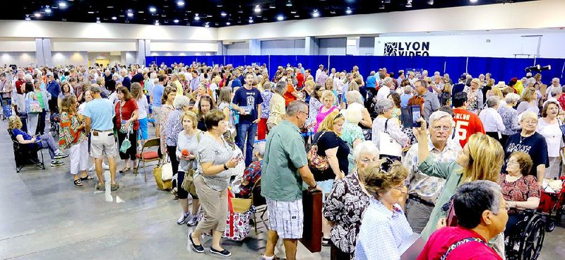 Thousands of people waited in lines for hours to have their items appraised July 25 by Antiques Roadshow experts. The most expensive item appraised in Little Rock was a 1730s-era George II cabinet on a stand for $80,000 to $120,000.