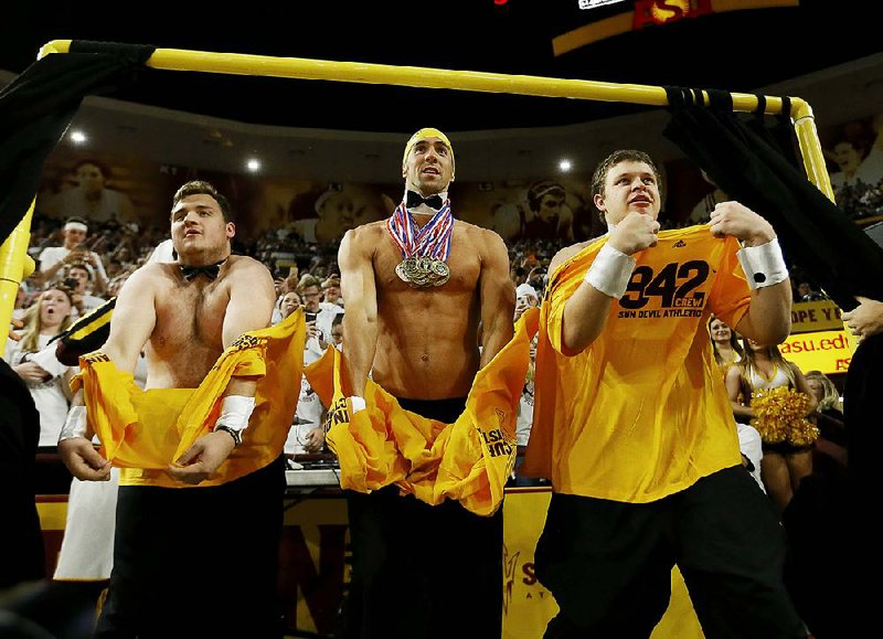 Olympic swimmer Michael Phelps was successful in helping Arizona State students distract an Oregon State player at the free-throw line in the Sun Devils’ victory Thursday.