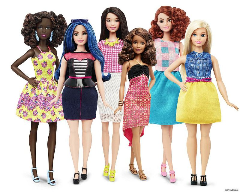 The redesigned Barbies introduced last week move away from the 57-year-old blond, blue-eyed version. 