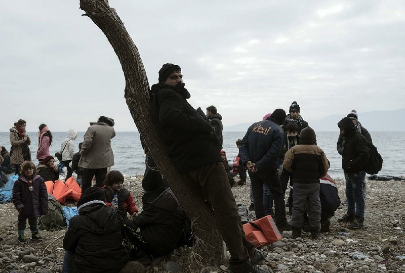 Migrants wait Friday near Ayvacik, Turkey, to board a boat to travel to the Greek island of Lesbos. More than 250 migrants have drowned this month trying to reach Greece’s islands. 