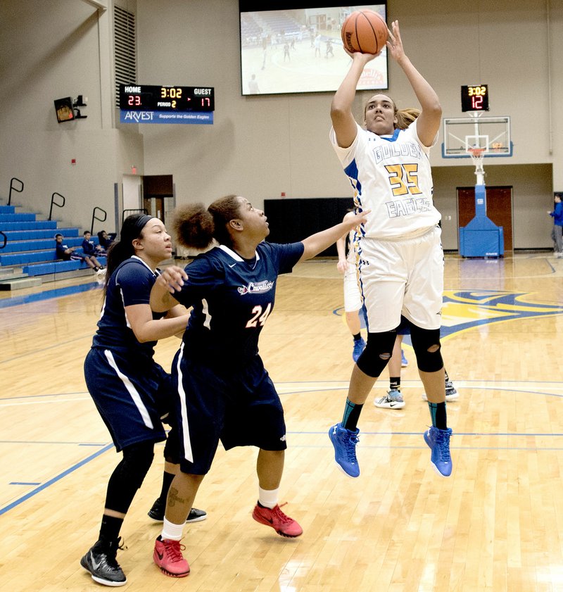Photo courtesy of JBU Sports Information John Brown senior Sofia Mendoza goes up for two of her 15 points in JBU&#8217;s 76-41 victory against St. Gregory&#8217;s on Thursday at Bill George Arena.