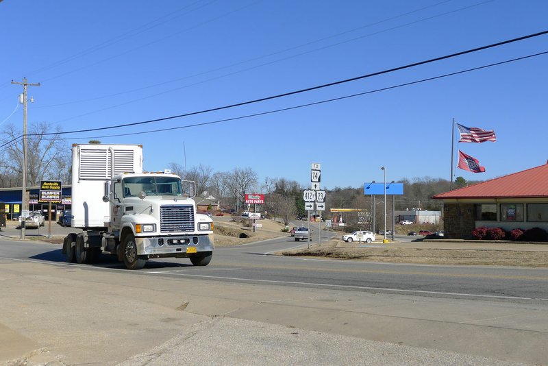 Residents say this intersection of Lee Street and Arkansas 23 — soon to get a stoplight — is near the Huntsville High School and gets congested in the mornings and afternoons when school lets out.  