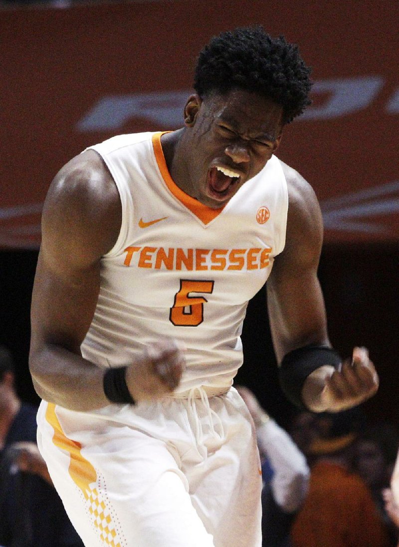 Tennessee’s Admiral Schofield reacts to the Volunteers taking the lead over Kentucky in the second half Tuesday night. The Vols trailed by 21 points before coming back to win.