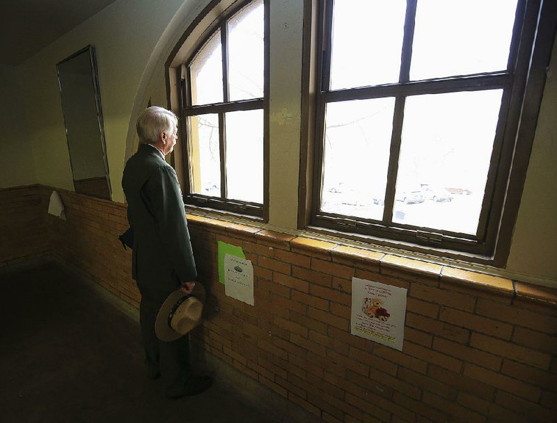 National Park Service Director Jonathan Jarvis looks at the campus from inside Little Rock Central High School during a tour Tuesday morning.