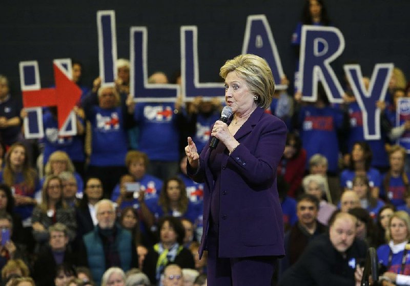 Hillary Clinton, playing up her narrow victory in Iowa, urged supporters Tuesday at a rally in Nashua, N.H., to consider which candidate “is most likely to deliver” on campaign promises. 