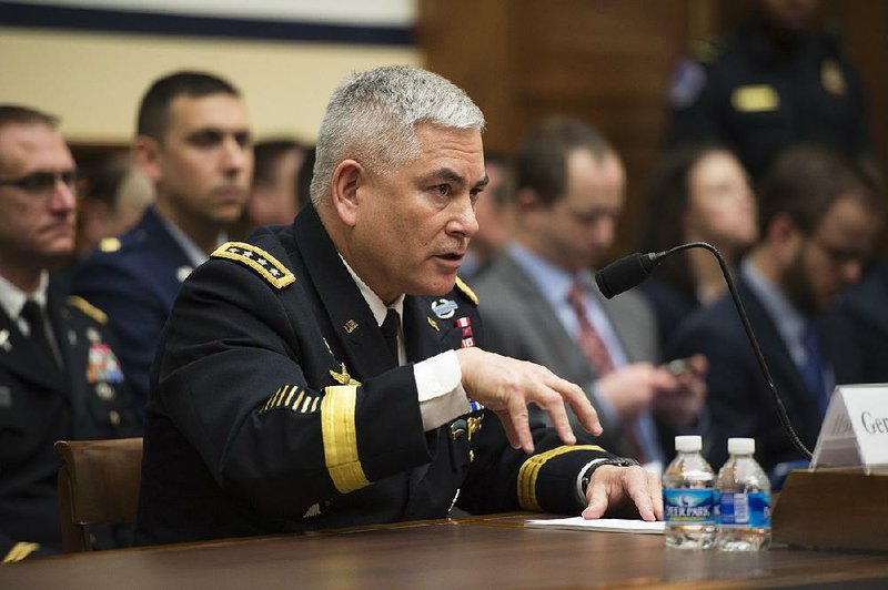 Army Gen. John Campbell, commander, Operation Resolute Support U.S. Forces, testifies on Capitol Hill in Washington on Tuesday before the House Armed Services Committee. 