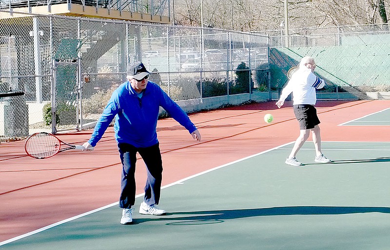 Lynn Atkins/The Weekly Vista On Thursday, temperatures reached the 50s during &#x201c;Men&#x2019;s Day&#x201d; on the Kingsdale Tennis Complex&#8217;s courts. Individuals sign up to play each Thursday, then the tennis pro matches them with others of similar ability, player Al Baker explained. After playing tennis here for 10 years, Baker said he usually knows everyone the pros match him with. Many of the men also play on teams. Bella Vista is changing, Baker said, remarking that it was difficult to even get a court10 years ago. On Thursday, his foursome were the only people playing.