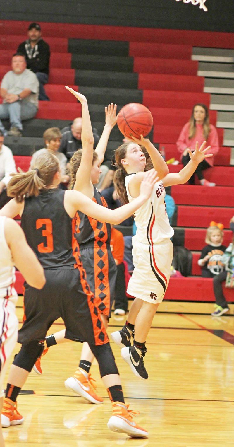 Photograph by Russ Wilson Junior Lady Blackhawk Jennifer Anthony, 5&#8217;3&#8221;, scored 4 points Friday night in the Colors Day game against the Lady Lions from Gravette.