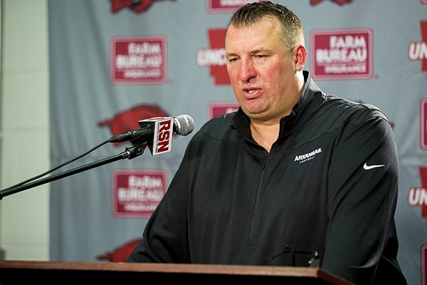 Arkansas coach Bret Bielema speaks with members of the media on Wednesday, Feb. 3, 2016, inside the Fred W. Smith Center in Fayetteville on the results from National Signing Day.