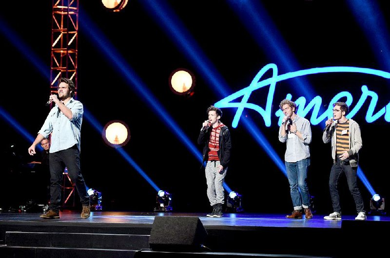 Thomas Stringfellow (left) of Bentonville (formerly North Little Rock) shines at Group Round during Hollywood Week of American Idol.
