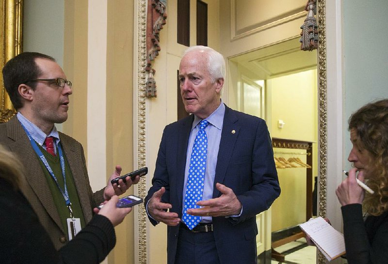 Senate Majority Whip John Cornyn of Texas said during a Capitol Hill meeting on an energy bill that he thinks it’s “premature” to write a multimillion-dollar check to help Flint, Mich. 