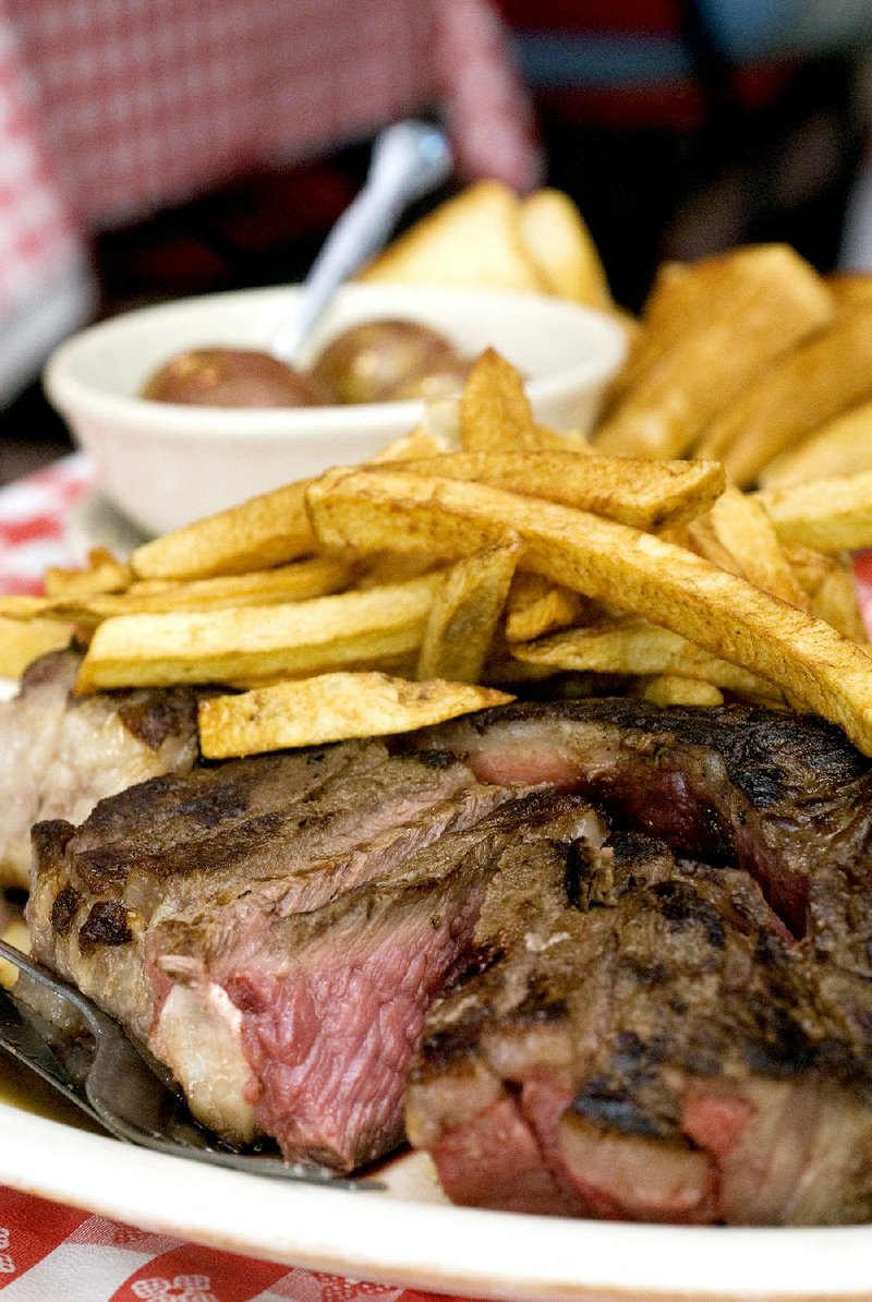 The T-bone steak at Doe’s Eat Place in Little Rock comes in 2-, 2.5- and 3-pound cuts.