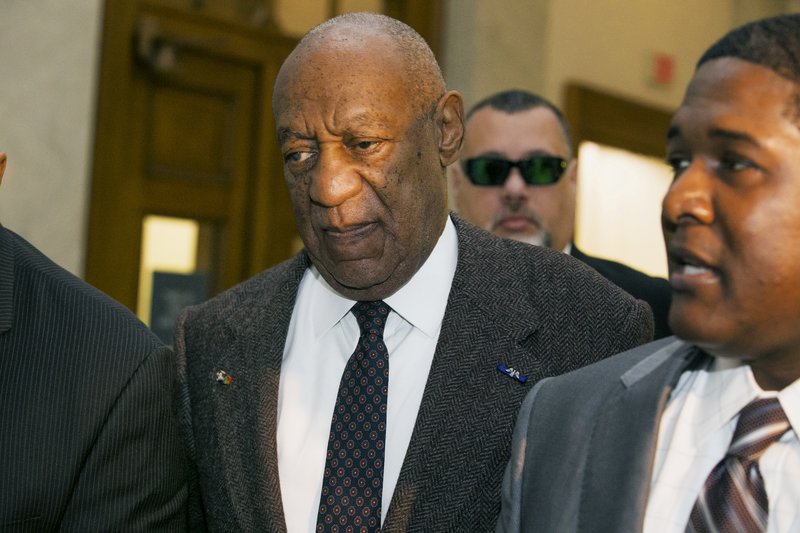 Actor and comedian Bill Cosby arrives for a court appearance Wednesday, Feb. 3, 2016, in Norristown, Pa. Cosby was arrested and charged with drugging and sexually assaulting a woman at his home in January 2004. A judge will decide whether to dismiss a sexual assault case against the comedian over an unwritten promise of immunity that a former prosecutor says he gave Cosby's now-deceased lawyer. (Ed Hille/The Philadelphia Inquirer via AP, Pool)