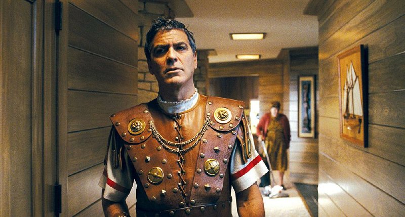 Baird Whitlock (George Clooney) is a rather dim-witted leading man who falls under the spell of some Communist screenwriters in the Coen brothers’ Hail, Caesar!, a period pastiche that spoofs religion, Old Hollywood and the counterculture.