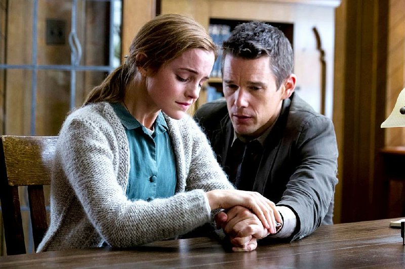 Angela Gray (Emma Watson) is a victim of ritual abuse and Bruce Kenner (Ethan Hawke) is the agnostic cop investigating her case in Alejandro Amenabar’s psychological horror film Regression.