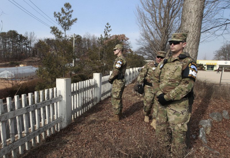 U.S. soldiers stand guard Thursday near Panmunjom in Paju, South Korea. Panmunjom is in the demilitarized zone. 