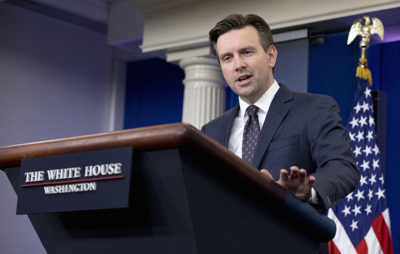 White House press secretary Josh Earnest speaks during the daily news briefing at the White House, in Washington, Thursday, Feb. 4, 2016. Earnest discussed that the number of Islamic State group fighters has dropped in Iraq and Syria, but is rising in Libya, and other topics. 
