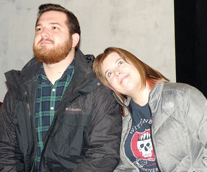 Pete, played by Saxon Whitehead, and Ginette, played by Darby Burdine, gaze at the stars in this scene from Almost, Maine, which will be presented by the Conway Community Arts Association and The Lantern Theatre beginning Friday. Pete and Ginette like each other but are shy and afraid to express their true feelings.