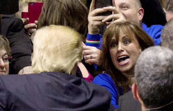 Paula Jones was photographed reaching out toward Donald Trump during a rally in Little Rock Wednesday. 