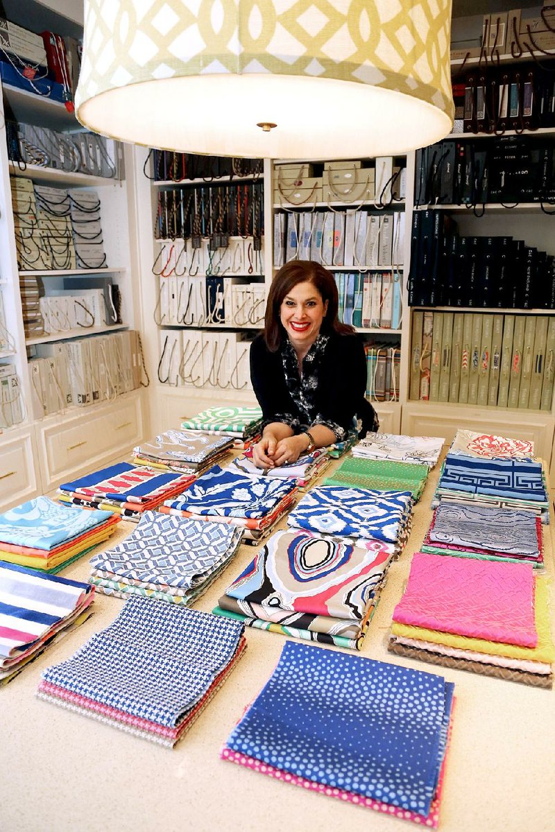 Interior designer Tobi Fairley (above) displays her new fabrics available this spring. The designer holds undergraduate degrees in accounting and interior design and a master’s degree in business administration and offers design services to homeowners as well as classes and mentoring to fellow designers on how to make their own businesses grow.