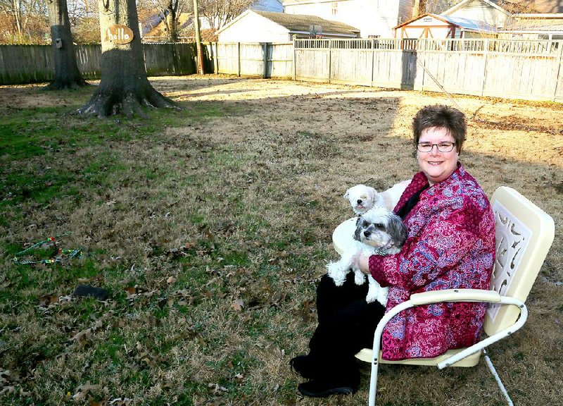 Debra Wood, and her favorite space is the backyard where she keeps rescue dogs.