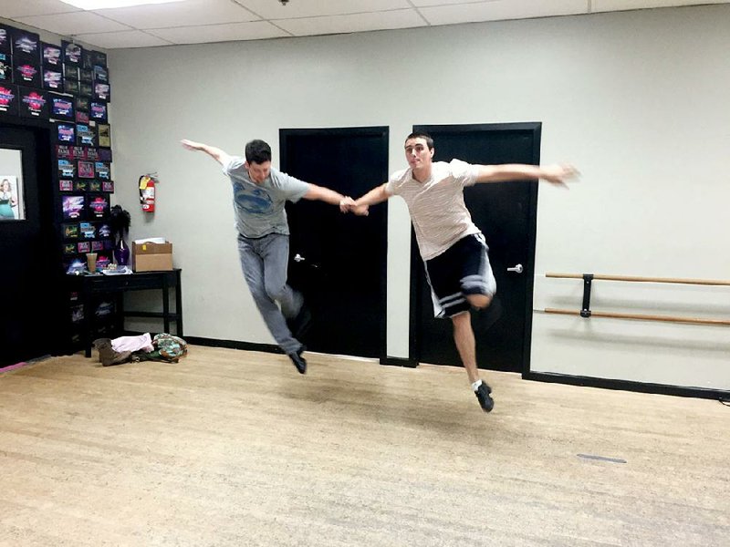 Matt Boyce and Anthony Hinrichs practice a Gregory and Maurice Hines number ahead of a performance in June at the Ron Robinson Theater.