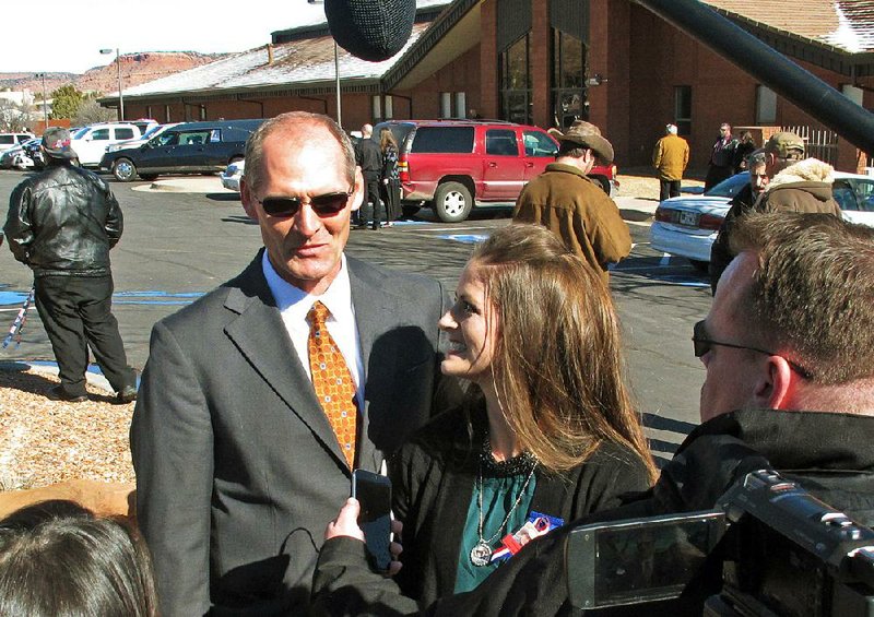 Guy Finicum, brother of Robert “LaVoy” Finicum, and Robert Finicum’s daughter, Thara Tenney, speak to reporters Friday before a funeral for Finicum in Kanab, Utah.