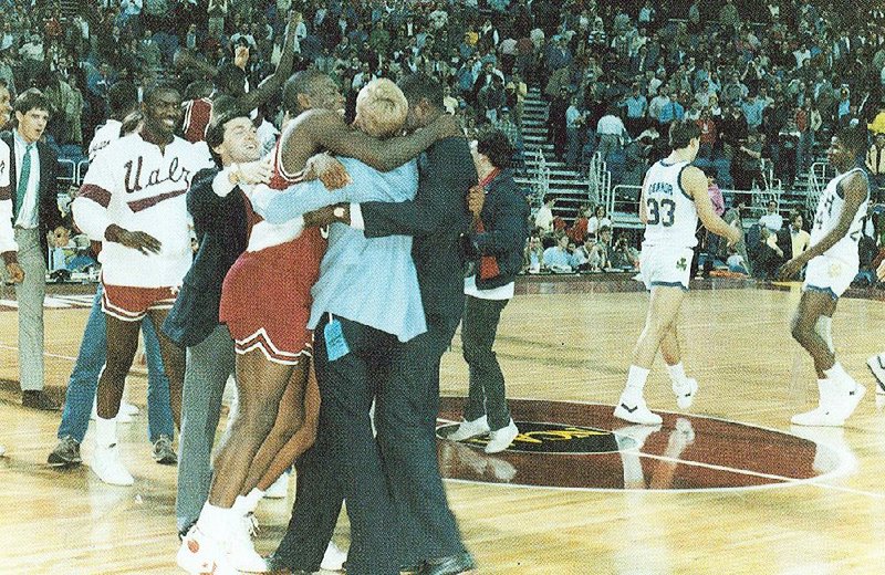 UALR players and coaches celebrate after defeating third-seeded Notre Dame in the first round of the 1986 NCAA Tournament in Minneapolis. The victory was UALR’s only tournament victory and made the Trojans one of two 14 seeds at the time to make it to the second round.