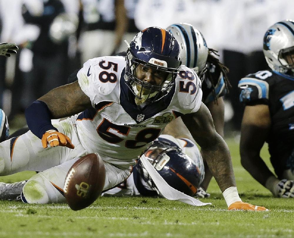 Lockdown Orange: Broncos defense confounds Cam, fits Manning with 2nd ring