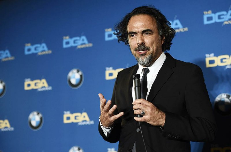 Alejandro Gonzalez Inarritu, director of "The Revenant," addresses reporters backstage after winning the Feature Film Award at the 68th Directors Guild of America Awards at the Hyatt Regency Century Plaza on Saturday, Feb. 6, 2016 in Los Angeles. 