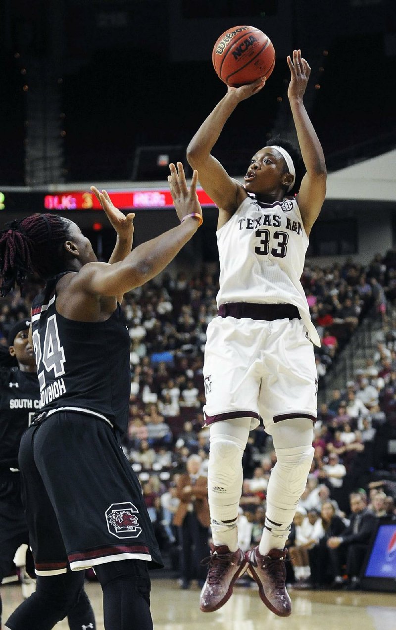 Texas A&M forward Courtney Walker (33) finished with 29 points Sunday, including 10 in overtime as Texas A&M beat Tennessee 76-71.
